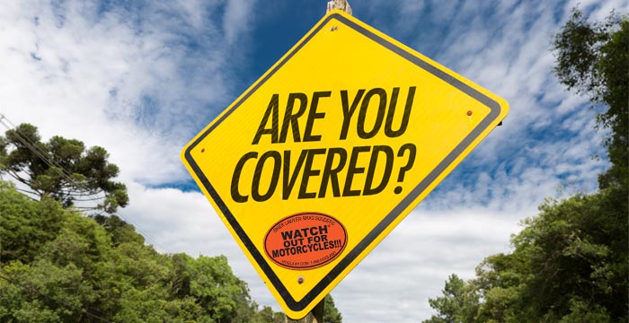 Yellow street sign Are you covered